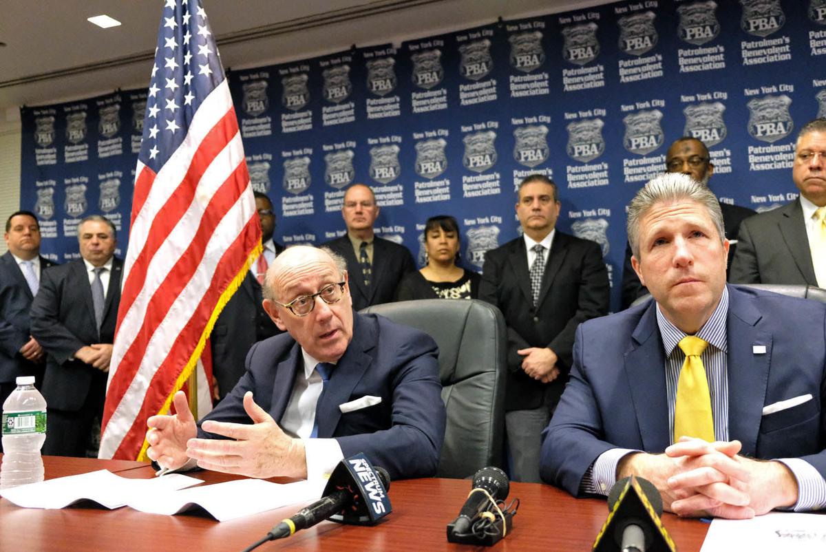 TURNING TO A COMPENSATION EXPERT: Kenneth Feinberg, best known for presiding over victim-compensation cases concerning those affected by terrorist attacks and Agent Orange, but with Patrolmen’s Benevolent Association President Patrick J. Lynch looking on, he told reporters that he believed he could make a strong case for the union in an upcoming wage arbitration because NYPD salaries early in cops’ careers are not ‘commensurate’ with the jobs&#x27;s duties and risks and what is paid to officers in neighboring jurisdictions. (The Chief-Leader/Michel Friang)