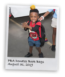 PBA Donates Book Bags to Far Rockaway’s Children